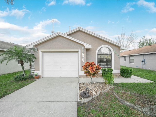 single story home featuring a garage and a front yard