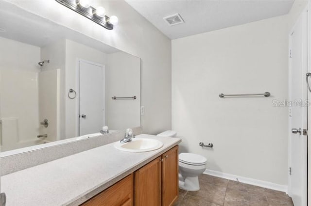 full bathroom with bathing tub / shower combination, vanity, and toilet