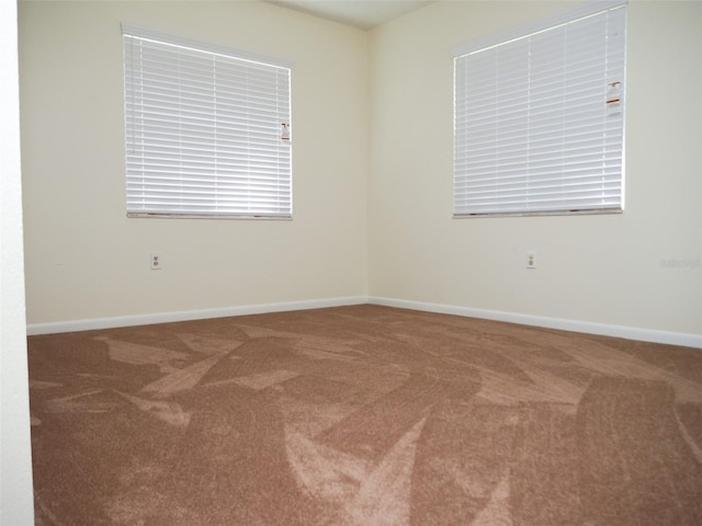 view of carpeted spare room