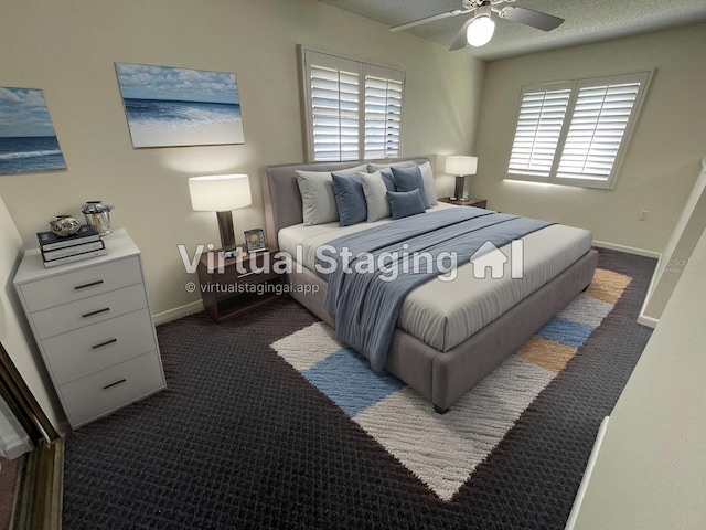 bedroom with ceiling fan and dark colored carpet