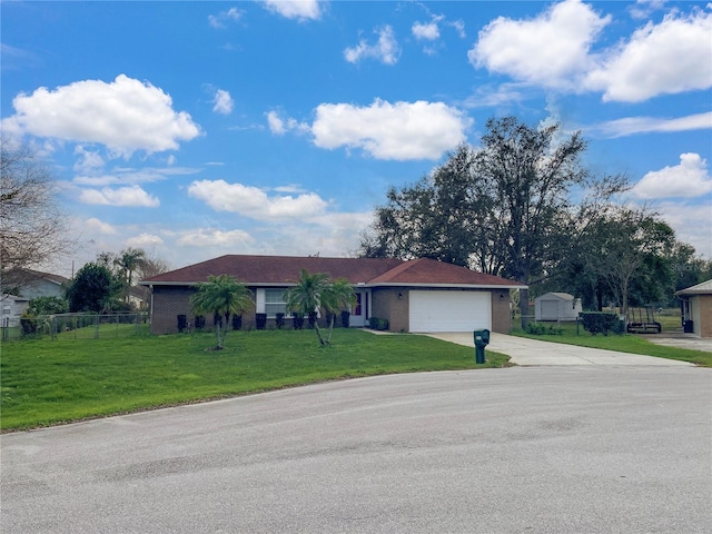 2111 Groveglen Ln S, Lakeland, FL 33813 - ranch-style house featuring concrete driveway, an attached garage, fence, and a front yard