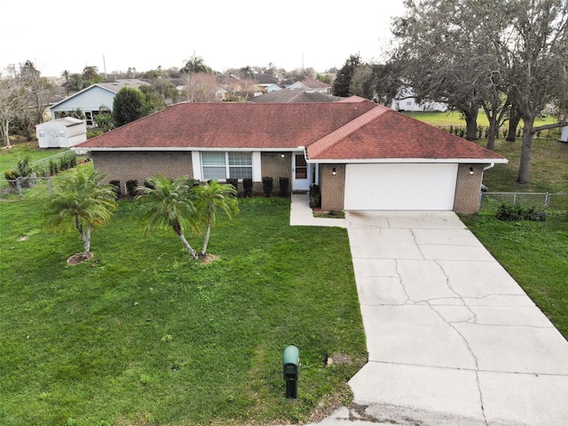 2111 Groveglen Ln S, Lakeland, FL 33813 - single story home featuring fence, an attached garage, a front lawn, and brick siding