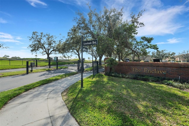 view of community featuring a lawn