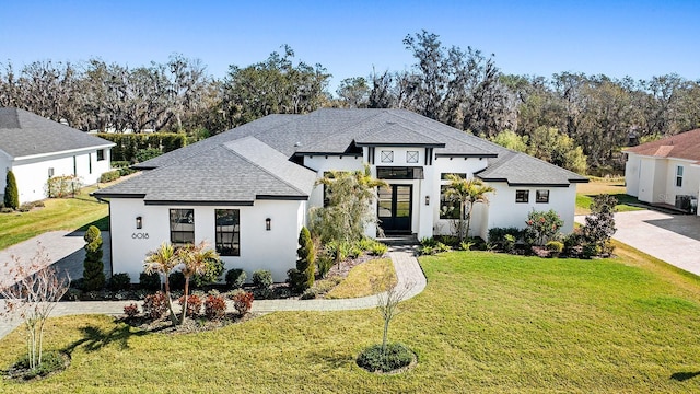 view of front of home with a front lawn