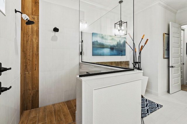 bathroom featuring tile walls, wood-type flooring, ornamental molding, and walk in shower