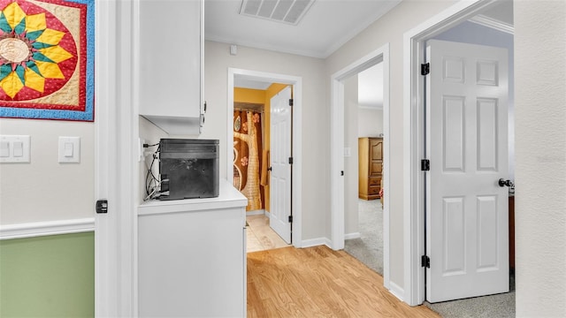 hallway featuring light hardwood / wood-style floors