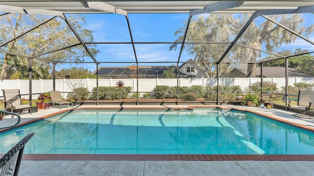 view of pool with a lanai