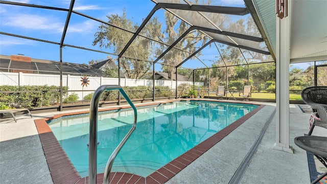 view of pool featuring a lanai and a patio area