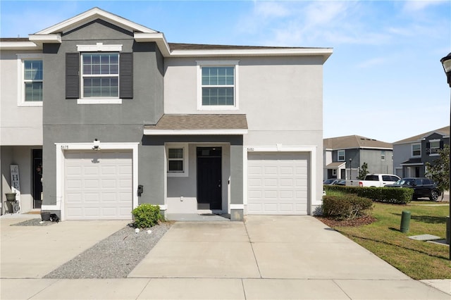 8680 Falling Blue Pl, Riverview, FL 33578 - view of front facade with driveway, a garage, stucco siding, and a front yard