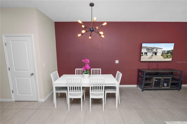 8680 Falling Blue Pl, Riverview, FL 33578 - dining area with a chandelier, baseboards, and tile patterned floors