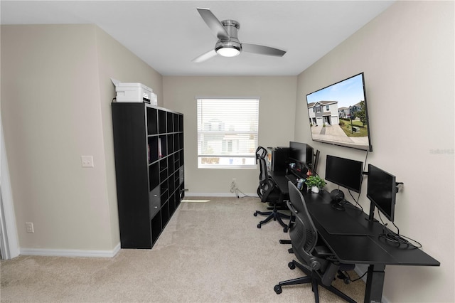 8680 Falling Blue Pl, Riverview, FL 33578 - home office with light carpet, baseboards, and a ceiling fan