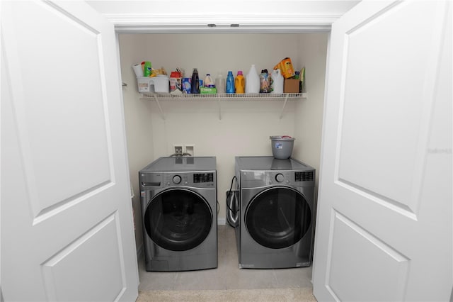 8680 Falling Blue Pl, Riverview, FL 33578 - laundry room with washer and clothes dryer and light tile patterned floors