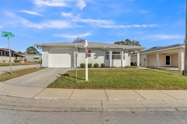 single story home with a garage and a front lawn