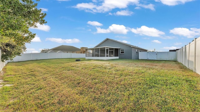 view of yard featuring a sunroom