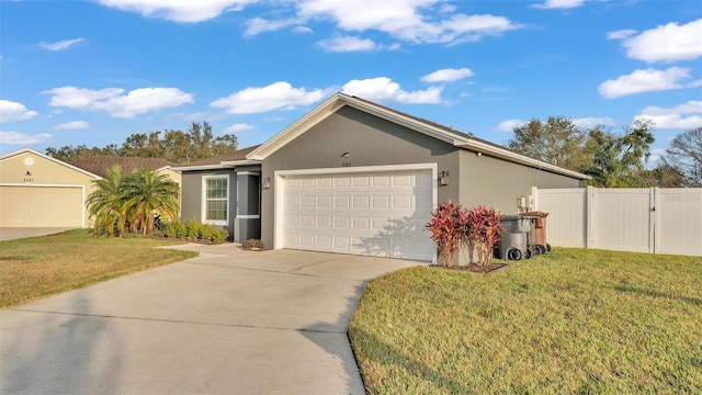 ranch-style house featuring a garage and a front yard