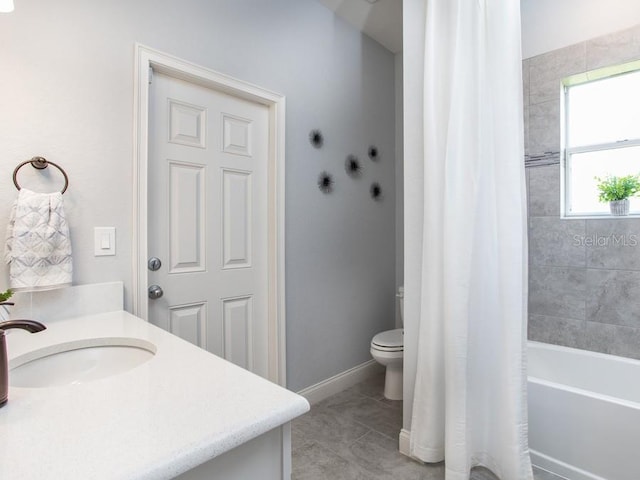 full bathroom with vanity, shower / tub combo with curtain, tile patterned floors, and toilet