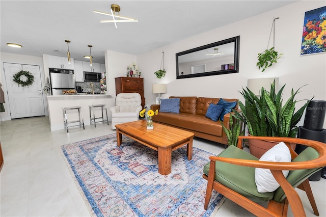 living room featuring sink