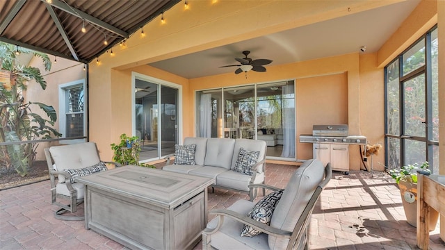 view of patio featuring an outdoor living space, a grill, and ceiling fan