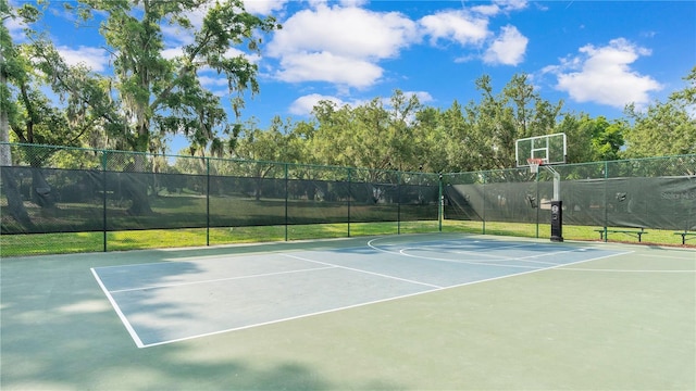 view of sport court with community basketball court and fence