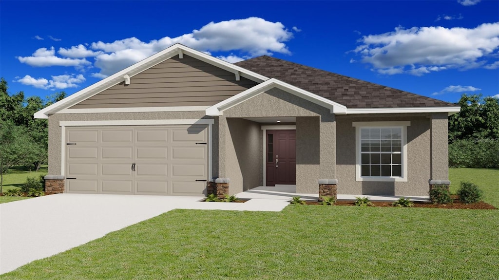 view of front of property with a garage and a front lawn