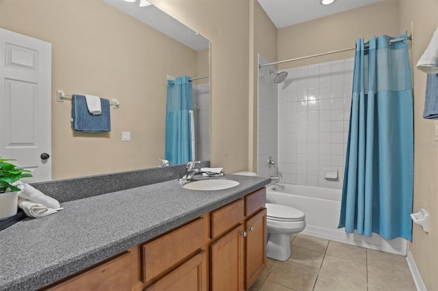 full bathroom featuring tile patterned floors, shower / bath combo, toilet, and vanity