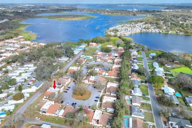 drone / aerial view with a water view