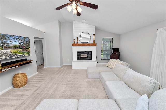 7410 Locksley Ln, Lakeland, FL 33809 - living area featuring carpet, a ceiling fan, baseboards, a large fireplace, and vaulted ceiling