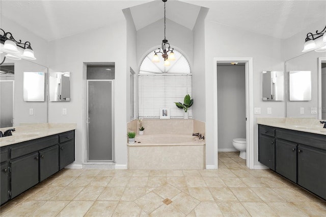 7410 Locksley Ln, Lakeland, FL 33809 - full bathroom with toilet, a sink, a bath, a shower stall, and lofted ceiling