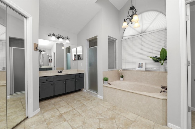 7410 Locksley Ln, Lakeland, FL 33809 - full bathroom featuring a bath, baseboards, lofted ceiling, a shower stall, and vanity