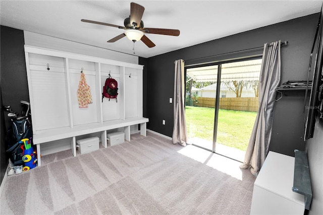 7410 Locksley Ln, Lakeland, FL 33809 - mudroom featuring ceiling fan, carpet, and baseboards