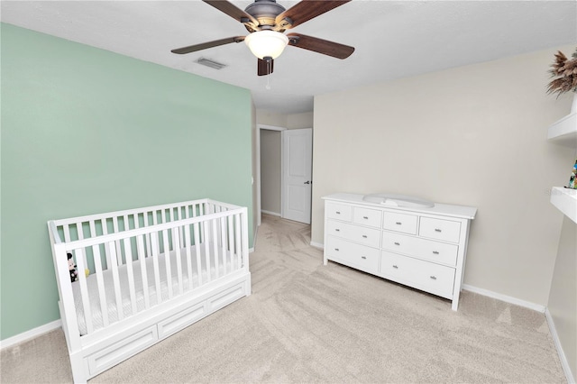 7410 Locksley Ln, Lakeland, FL 33809 - bedroom featuring baseboards, light carpet, and visible vents