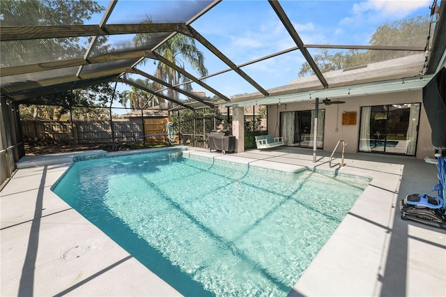 7410 Locksley Ln, Lakeland, FL 33809 - view of pool with a patio, a ceiling fan, fence, a lanai, and a fenced in pool