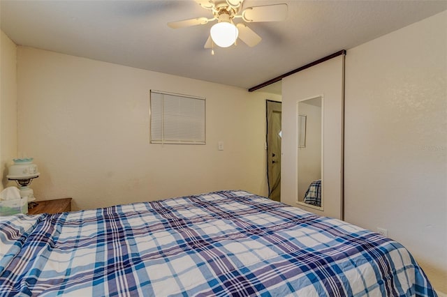 bedroom featuring ceiling fan