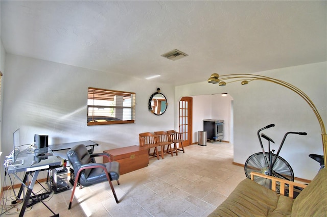 home office with visible vents and baseboards