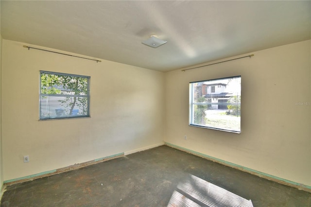 unfurnished room with a wealth of natural light