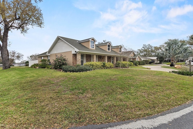 view of home's exterior featuring a lawn