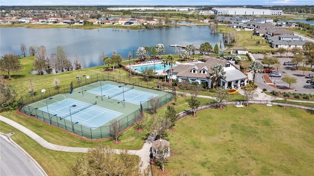 bird's eye view featuring a residential view and a water view