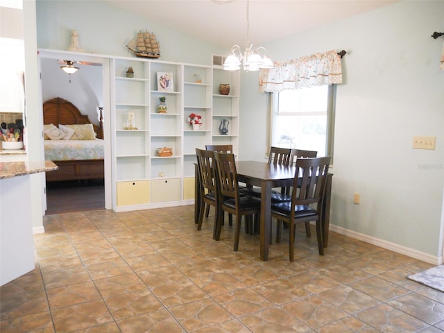 dining room with vaulted ceiling, visible vents, and a notable chandelier