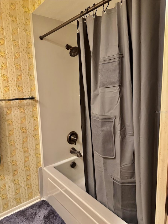 bathroom featuring shower / bath combo with shower curtain