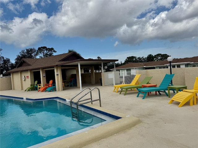 view of pool featuring a patio