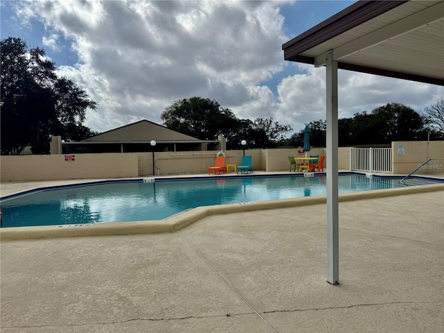 view of pool featuring a patio area