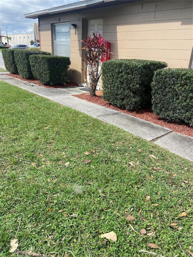 exterior space with a front lawn