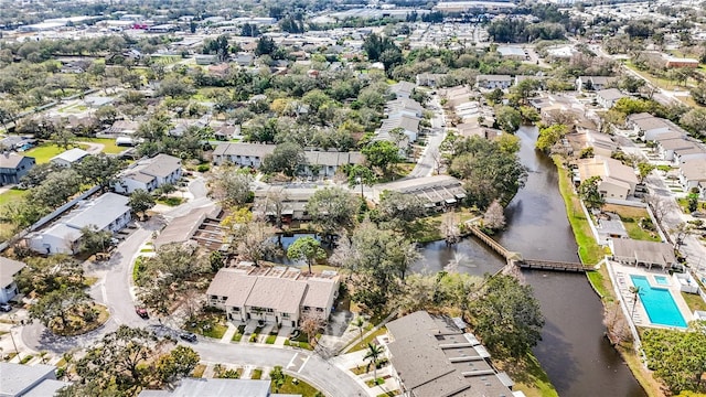 birds eye view of property featuring a residential view and a water view