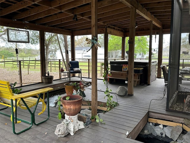 exterior space featuring a hot tub