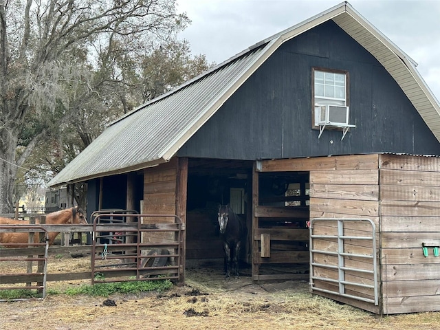 view of horse barn featuring cooling unit