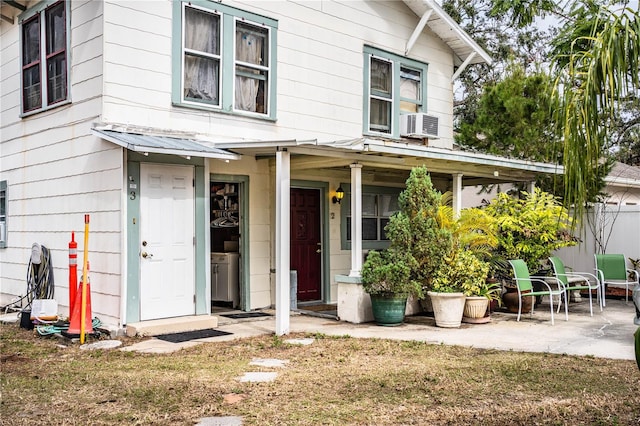 view of exterior entry featuring cooling unit