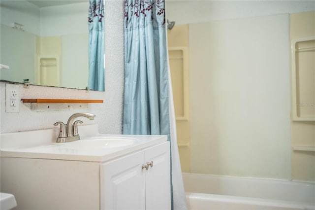 bathroom with vanity and shower / bath combination with curtain