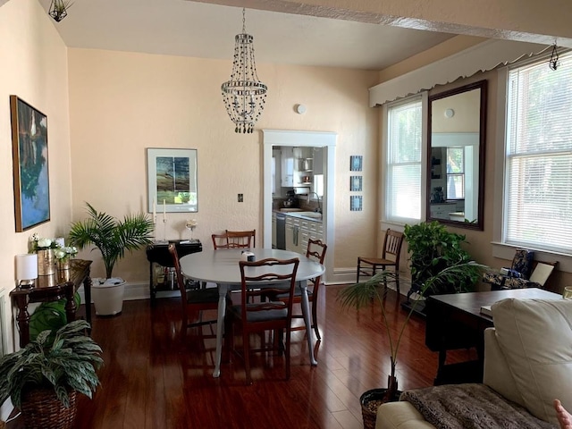 1919 W N A St, Tampa, FL 33606 - dining space with baseboards, an inviting chandelier, and dark wood finished floors