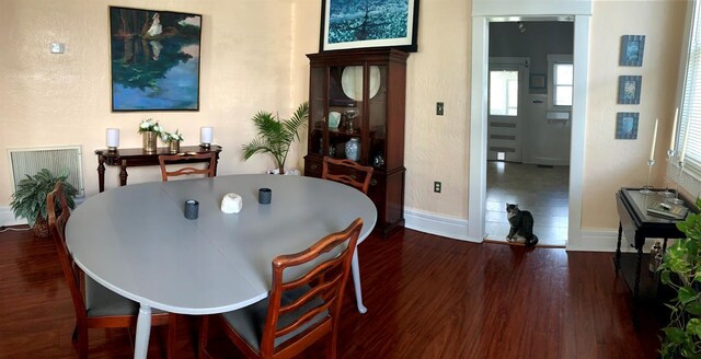 1919 W N A St, Tampa, FL 33606 - dining room featuring baseboards and wood finished floors