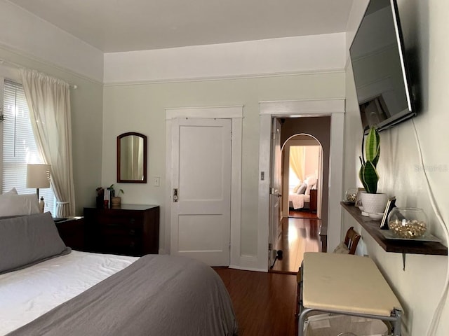 1919 W N A St, Tampa, FL 33606 - bedroom with arched walkways and wood finished floors